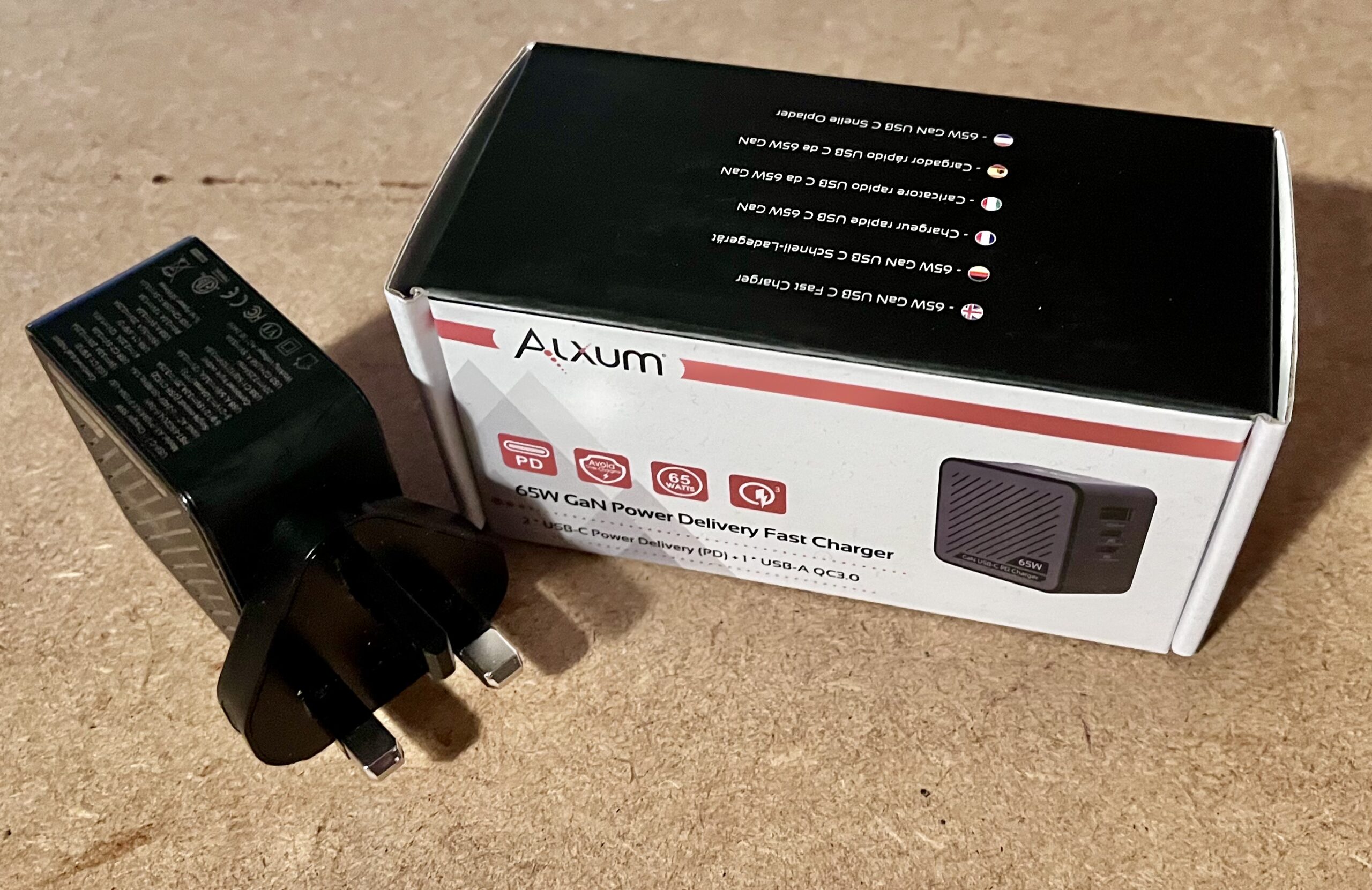 An Alxum power brick with the box